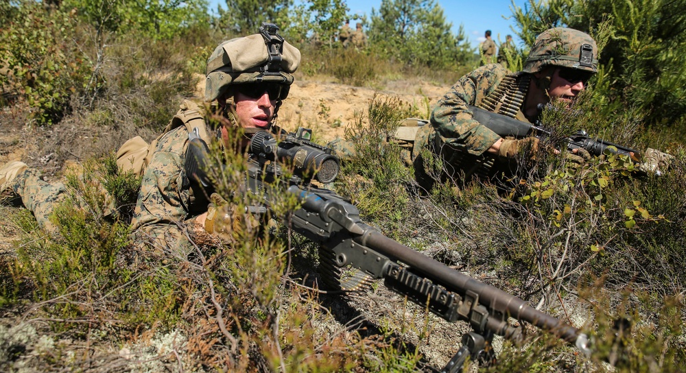 U.S. Marines ready to lay down suppressing fire during offensive maneuvers
