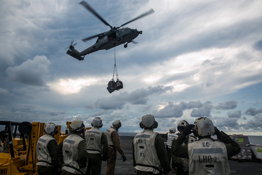 U.S. Marines, Sailors re-fill the cupboards