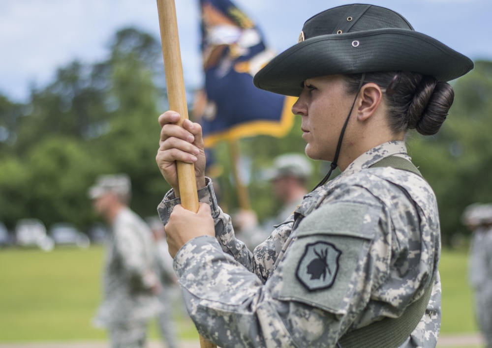 Female Drill Sergeant out front
