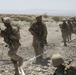 Marines move and shoot down range in cooperative exercise