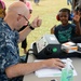 Mercy crew participate in a health fair in Seaqaqa, Fiji during Pacific Partnership 2015