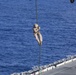 Marines practice fast roping on ship