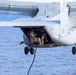 Marines practice fast roping on ship