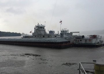 Coast Guard responds after barges hit dam protection wall, break free from tug