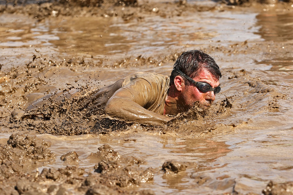 Racers get down and dirty during 2015 World Famous Mud Run