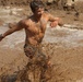 Racers get down and dirty during 2015 World Famous Mud Run