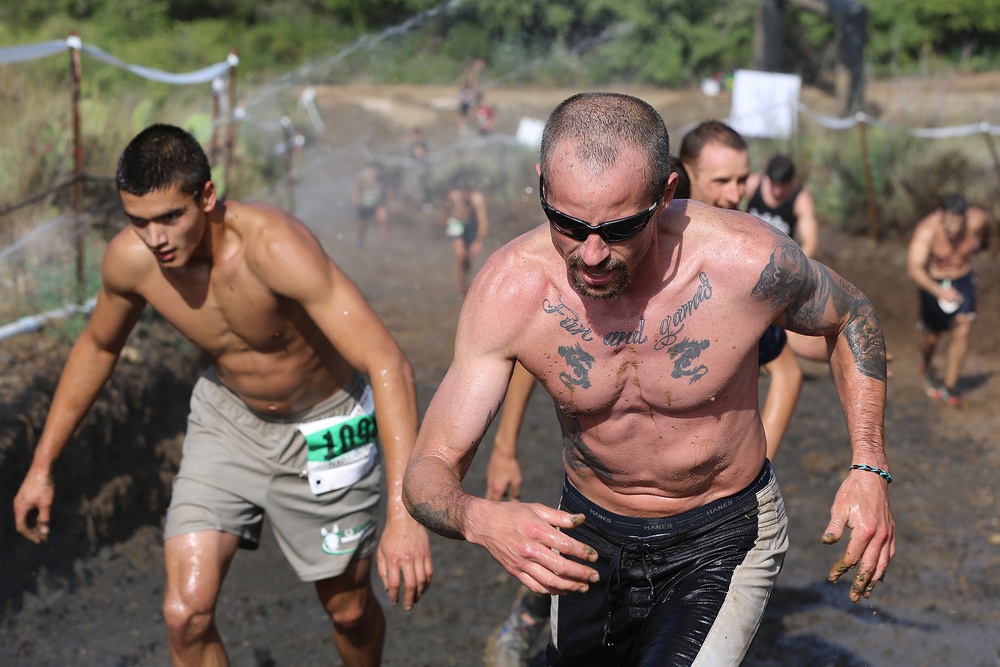 Racers get down and dirty during 2015 World Famous Mud Run