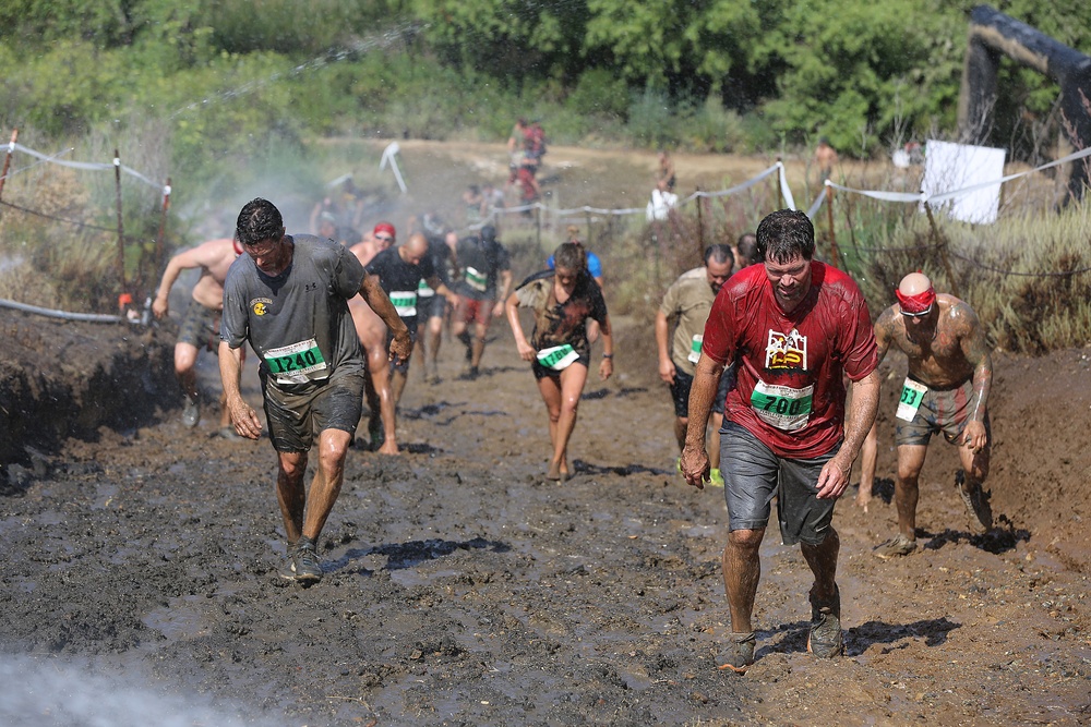Racers get down and dirty during 2015 World Famous Mud Run