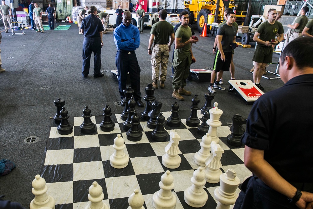 U.S. Marines, Sailor enjoy a Steel Beach