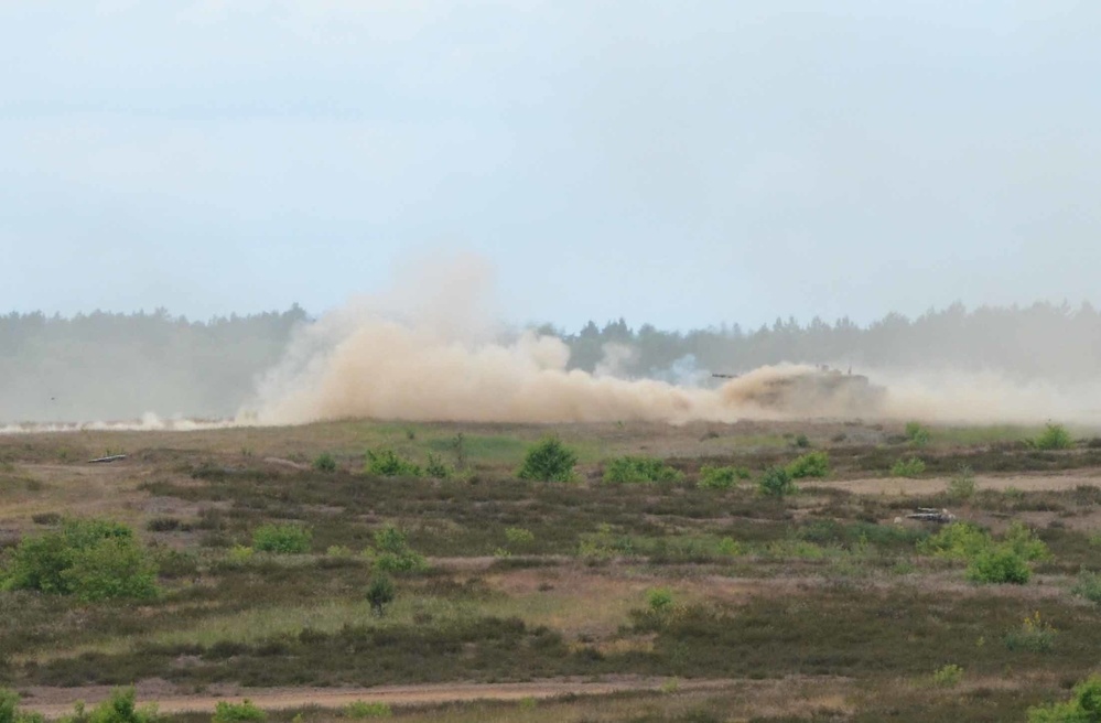 Danish and American Soldiers participate in a Combined Arms Live Fire Exercise at Saber Strike 15
