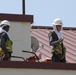 Contractors repair roof
