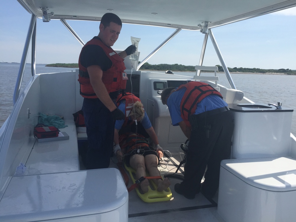 Coast Guard, Dare County EMTs assist injured woman near Wanchese, NC