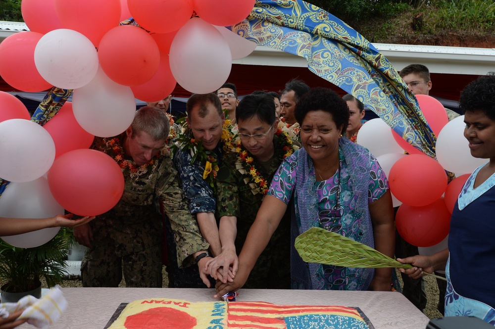 Mercy crew members participate in closing ceremony for the Viani Primary School during Pacific Partnership 2015