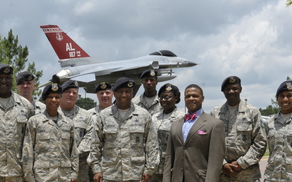 187th Fighter Wing SF members take group photo with 'Top Cop'