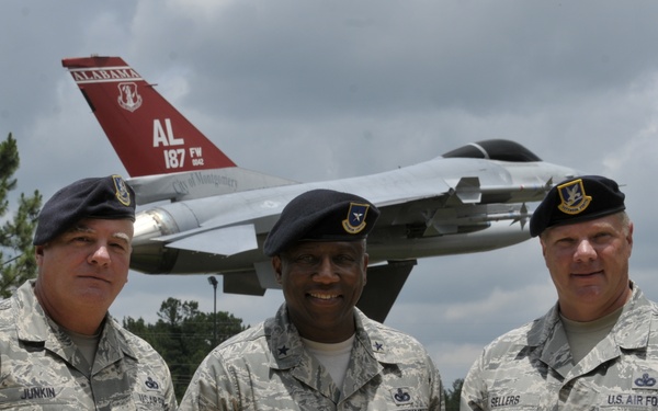 Chief Master Sgts. take group photo with 'Top Cop'