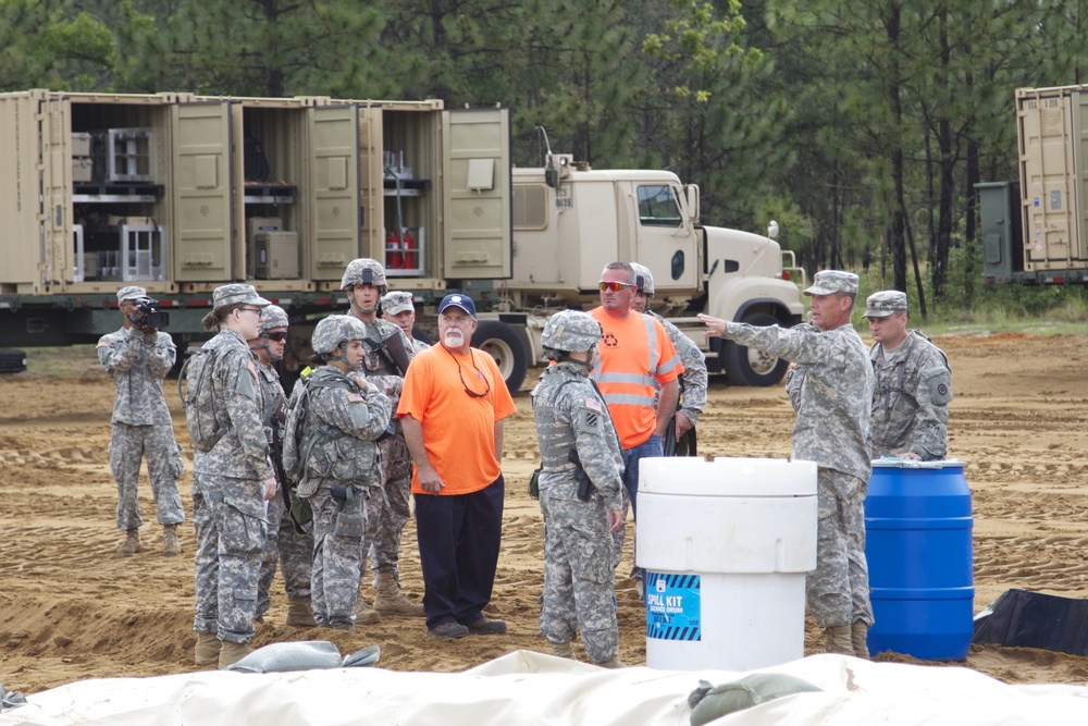 Fuel bag configuration being inspected by Defense Logistics Agency personnel