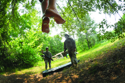 Soldiers retrieve simulated remains