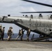 U.S. Marines fast rope from CH-53E Super Stallion at Sea