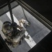 U.S. Marines fast rope from CH-53E Super Stallion at Sea