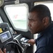 Belize coast guard sailor still at the helm