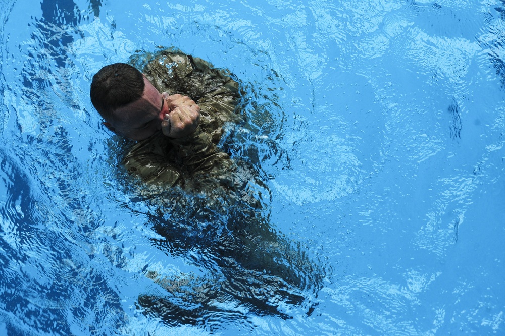 U.S. Marines dive into water survival training