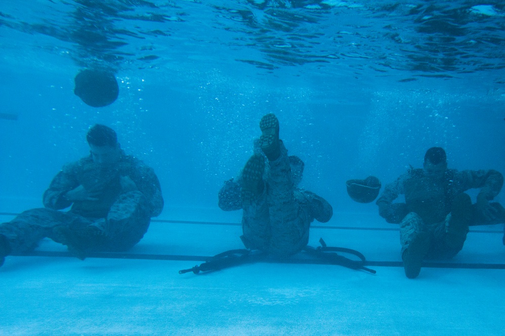 U.S. Marines dive into water survival training