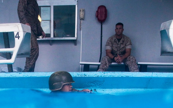 U.S. Marines dive into water survival training