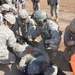 Cavalry field medics get trained on loading litter patients on medevac flight