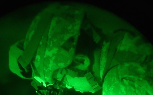 Engineer uses NVGs for bridge recon