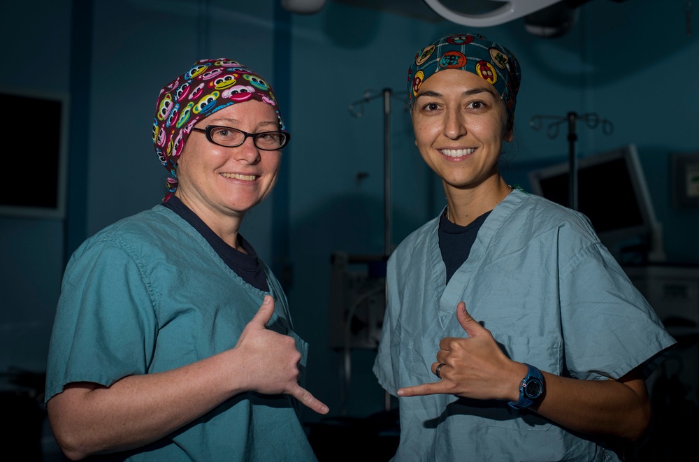 Longtime friends and Navy surgeons aboard USNS Mercy during Pacific Partnership