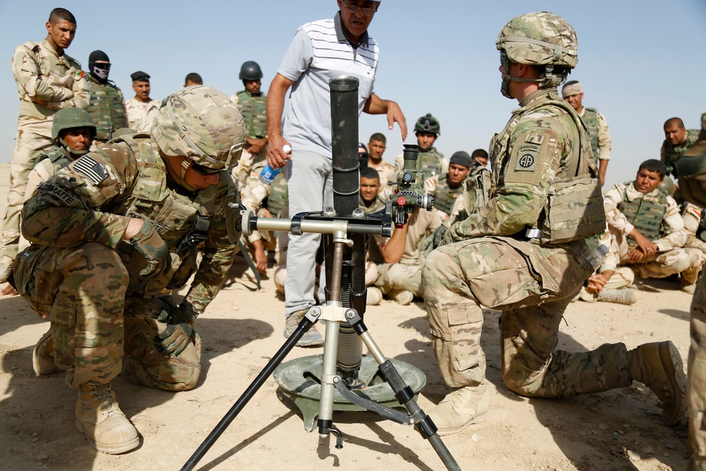 Iraqi army soldiers conduct training, receive equipment, weapons