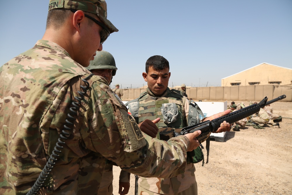 Iraqi army soldiers conduct training, receive equipment, weapons