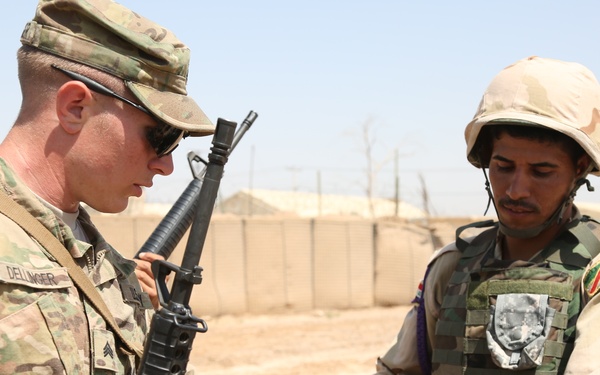 Iraqi army soldiers conduct training, receive equipment, weapons