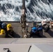 Marines and Sailors aboard USS Arlington conduct RAS