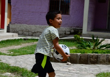 AFSOUTH Airmen make time to visit orphans, delivering gifts to those in need