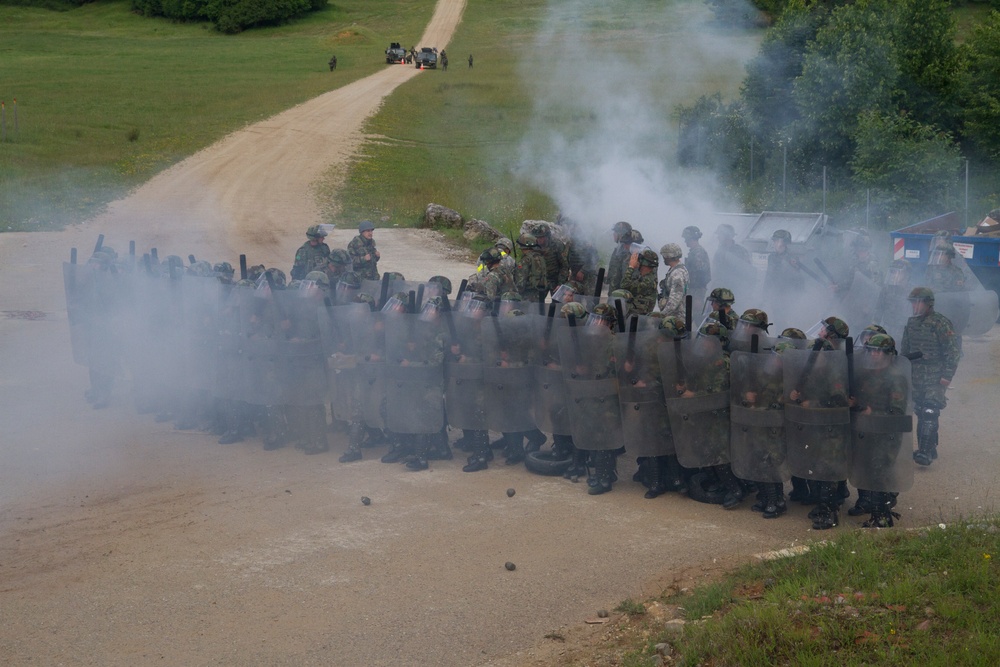 Smoke Rises around Albanian Army