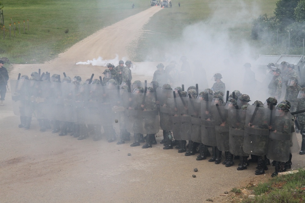 Smoke on the legion, Albanian army takes part in crowd riot control exercise