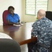 Meeting with Kieta District Manageress Lucy Travertz in Arawa, Papua New Guinea during Pacific Partnership 2015