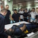Service members conduct mass casualty training on board USNS Mercy during Pacific Partnership 2015