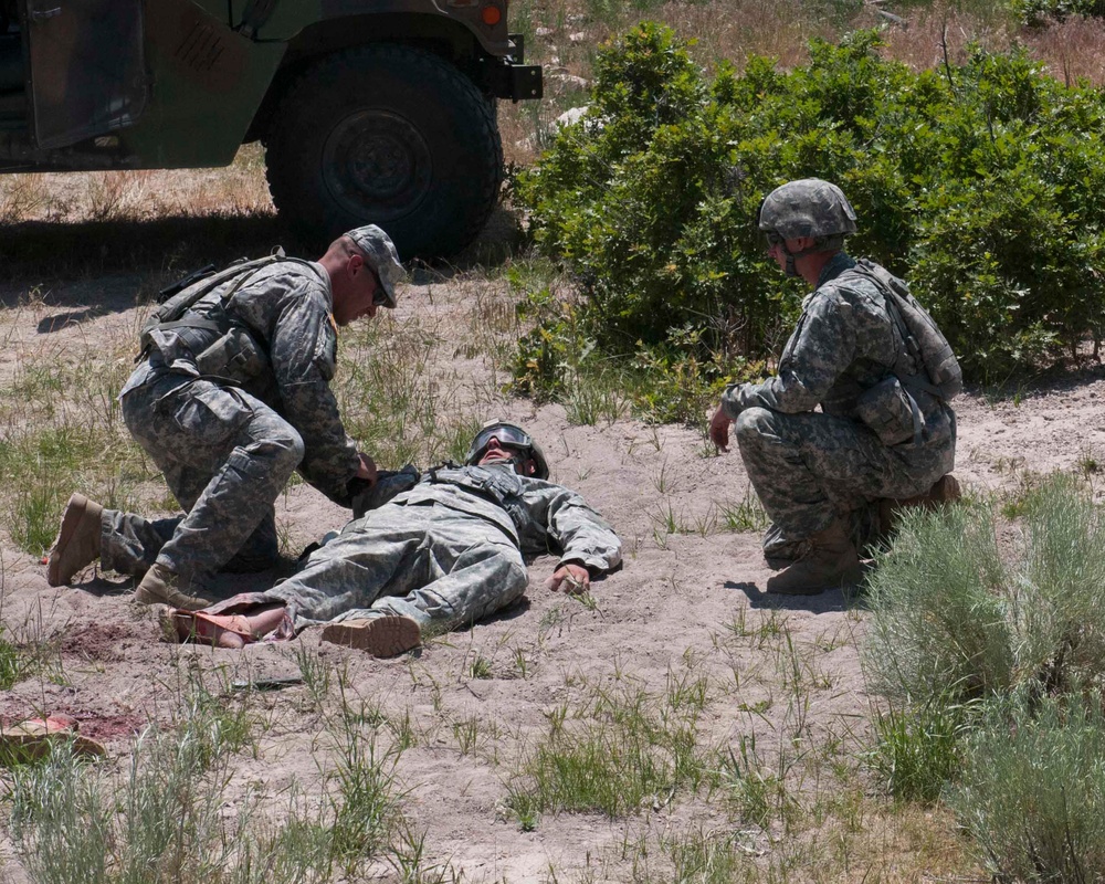 Competitors sweat their way through the Skills Stations/Land Navigation event during the 2015 ARNG Best Warrior competition, June 24