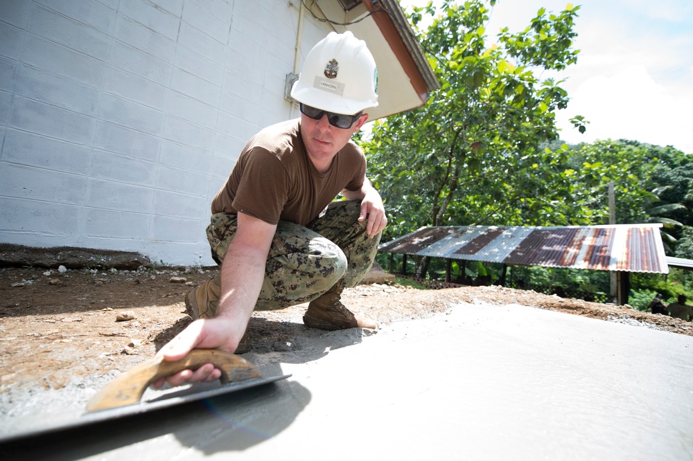 Seabees pour concrete at school renovation