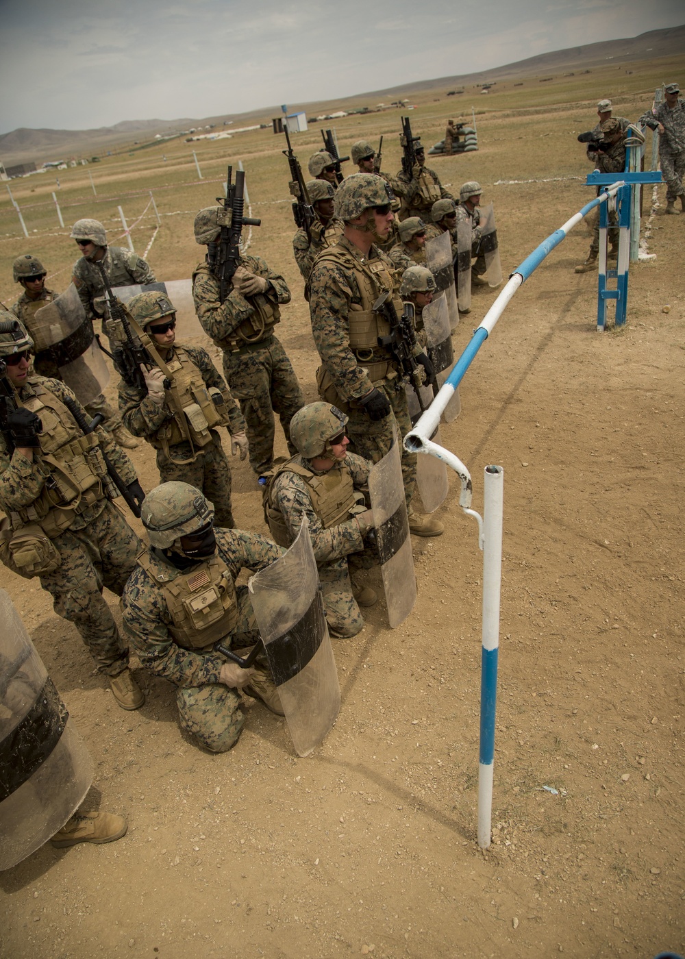 Multinational Participants train in riot control tactics