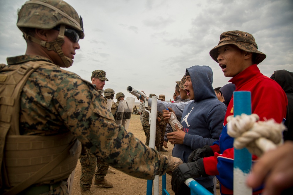 Multinational Participants train in riot control tactics