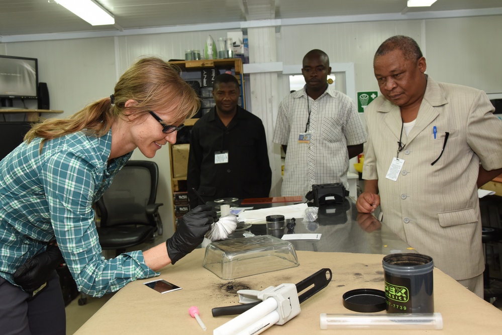 Tanzanian Defense Force service members attend forensic training