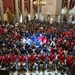 Athletes participating in the 2015 Department of Defense (DoD) Warrior Games take a photo with congressmen during a tour of the U.S. Capitol