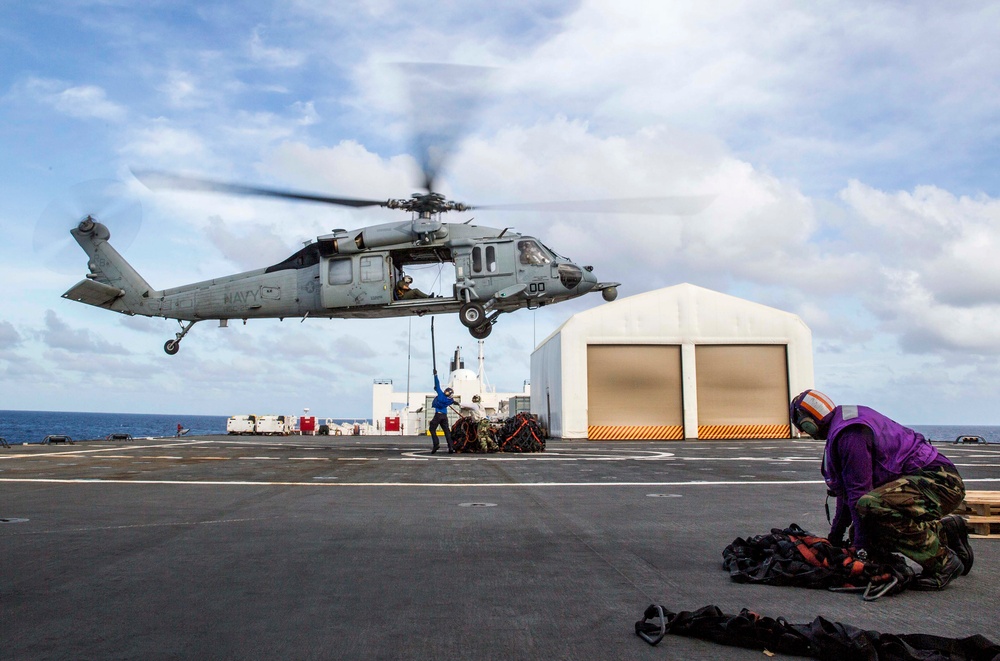 USNS Mercy conducts replenishment at sea with USNS Washington Chambers during Pacific Partnership 2015