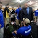 DSD Bob Work and his wife attend the 2015 Defense Department Warrior Games shooting competition