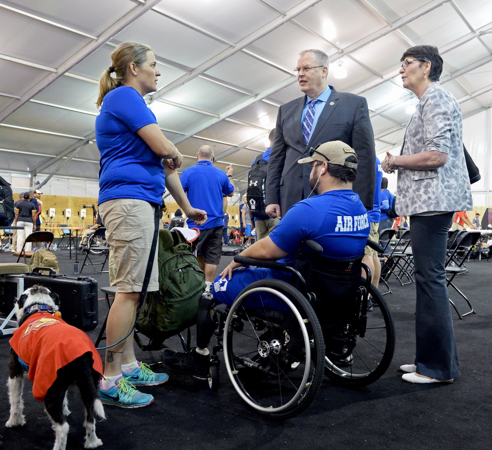 DSD Bob Work and his wife attend the 2015 Defense Department Warrior Games shooting competition