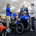 DSD Bob Work and his wife attend the 2015 Defense Department Warrior Games shooting competition