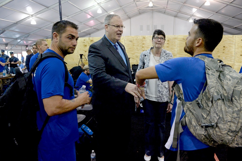 DSD Bob Work and his wife attend the 2015 Defense Department Warrior Games shooting competition